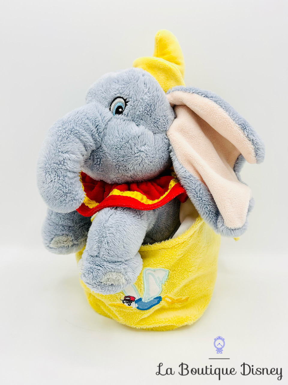 Peluche Dumbo sac jaune Disneyland Paris Disney éléphant monsieur Cigogne 29 cm