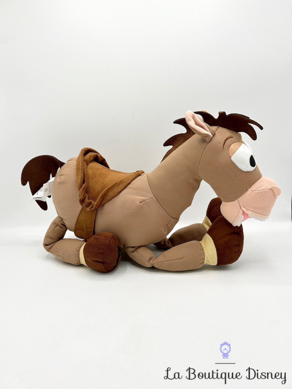 peluche-pile-poil-cheval-marron-toy-story-disney-store-écusson-2