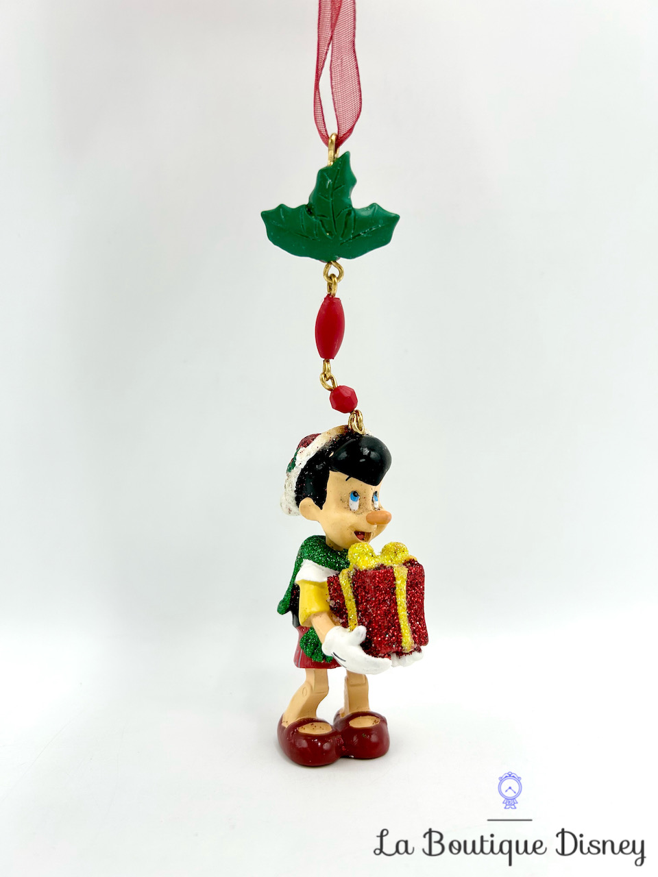Ornement Noël Pinocchio Disneyland Paris Disney boule suspension paillettes cadeau