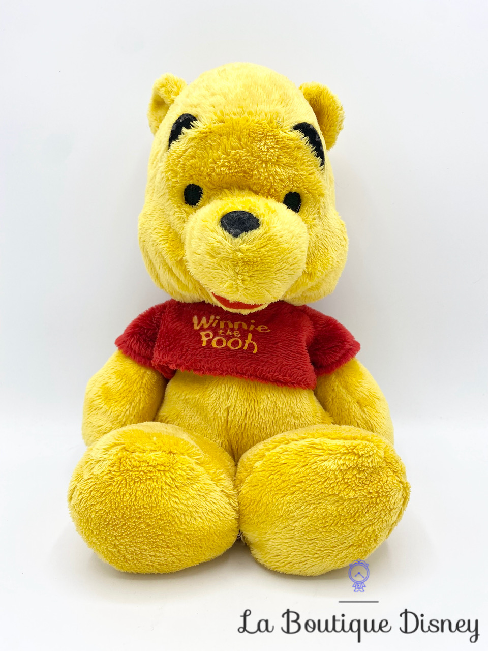 Peluche Winnie l’ourson Disney Nicotoy ours jaune rouge 32 cm