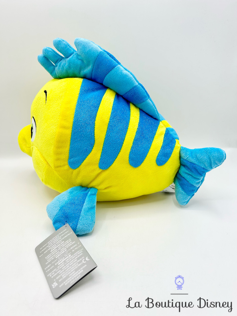 Peluche doudou poisson jaune bleu 26 cm Disney Store la Petite Sirène  Polochon chez vous des demain
