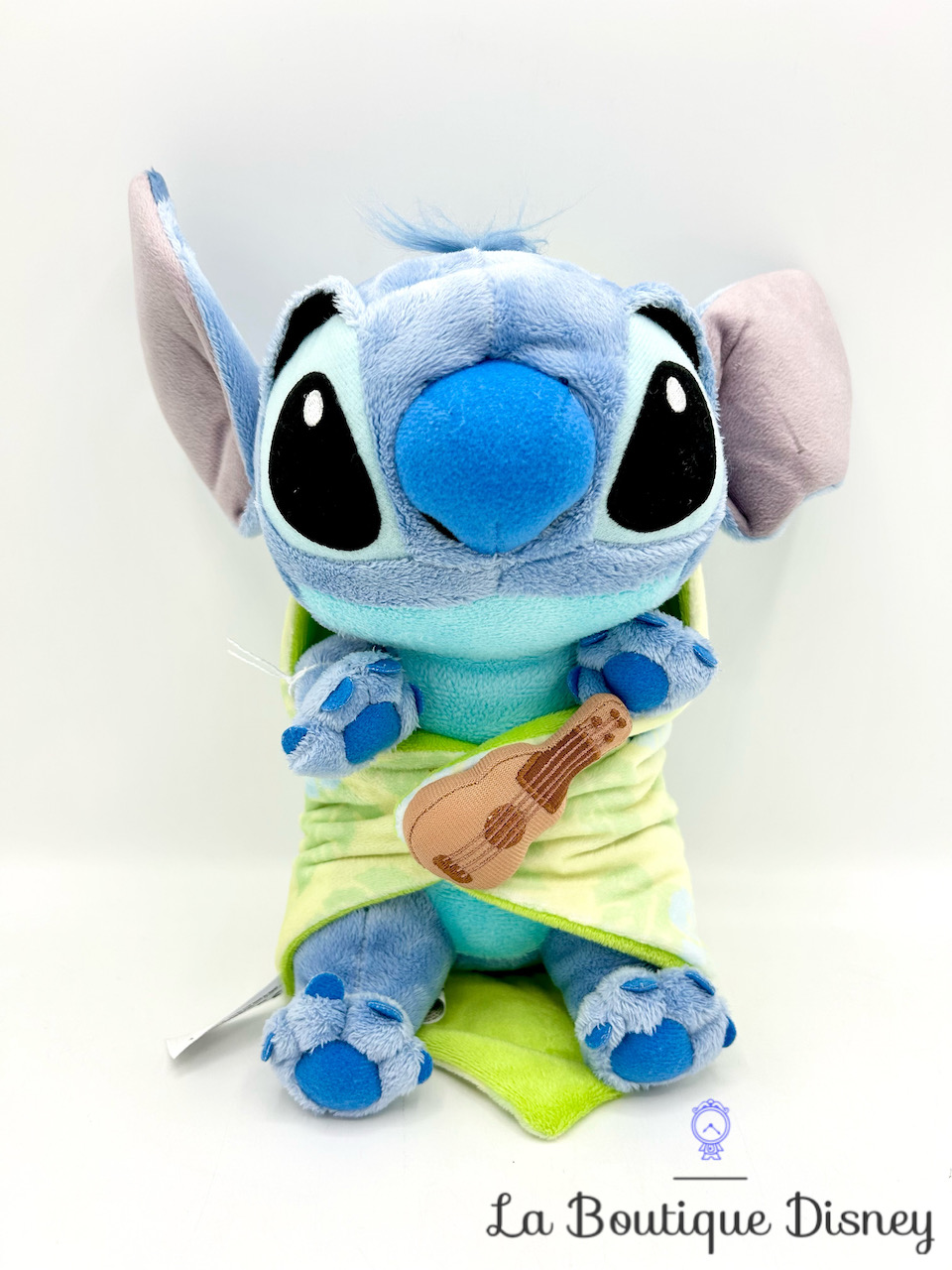 Peluche Stitch Disney Babies Disneyland Paris 2021 monstre bleu couffin couverture guitare