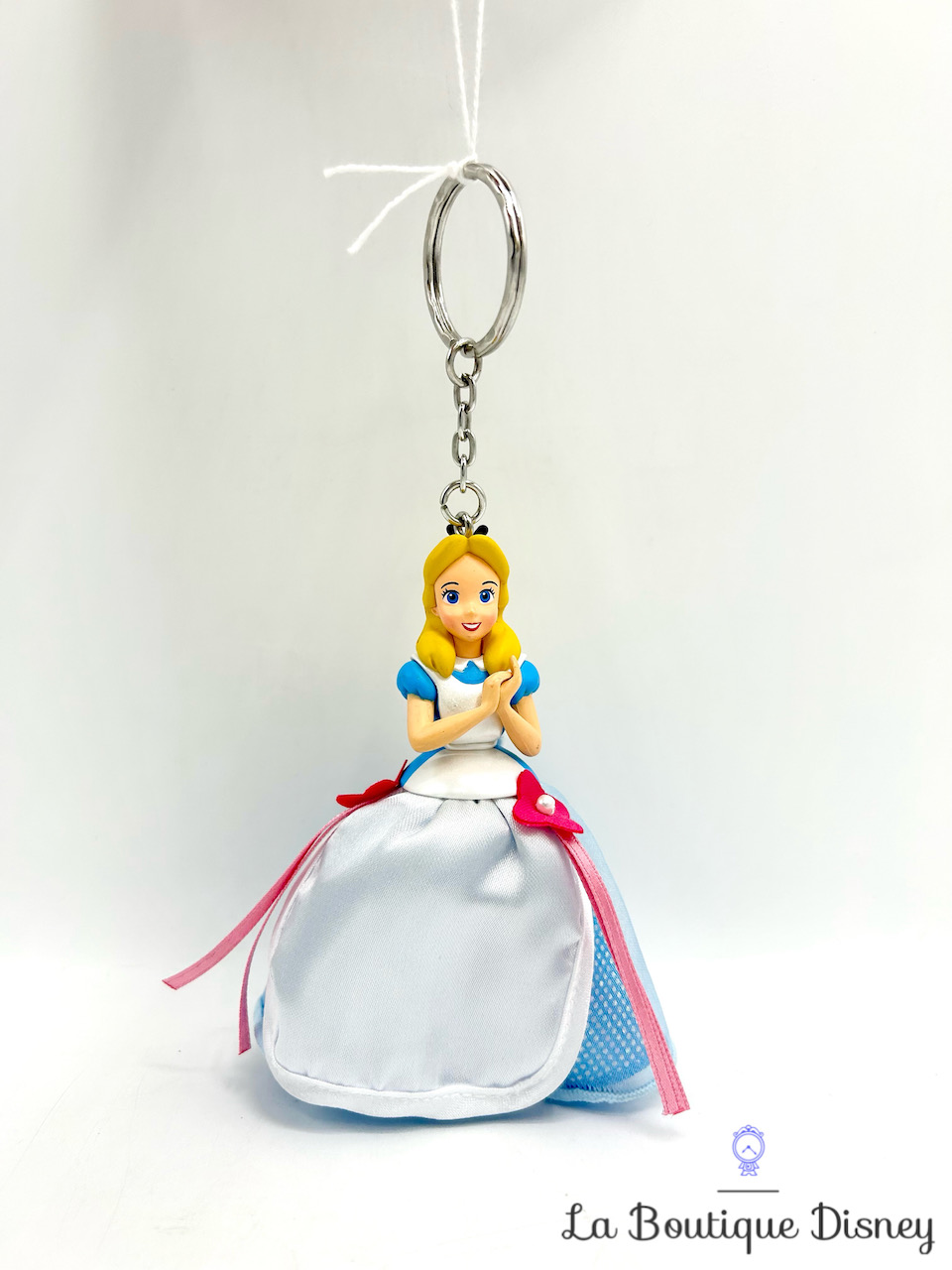 Porte clés Alice au pays des Merveilles Tokyo Disney Resort Japon figurine robe tissu