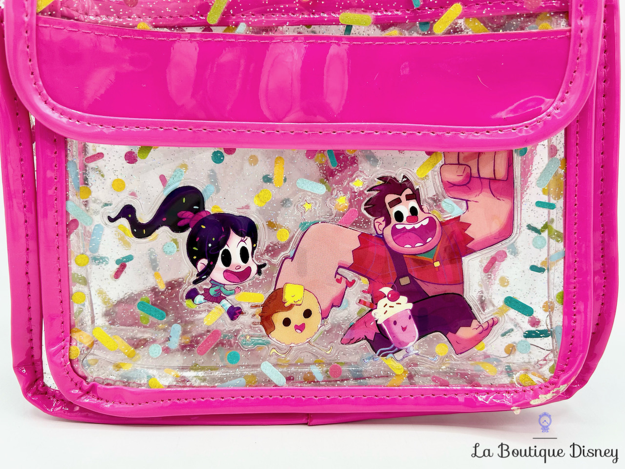 sac-a-dos-les-mondes-de-ralph-disney-store-rose-transparent-bonbon-vanellope-1