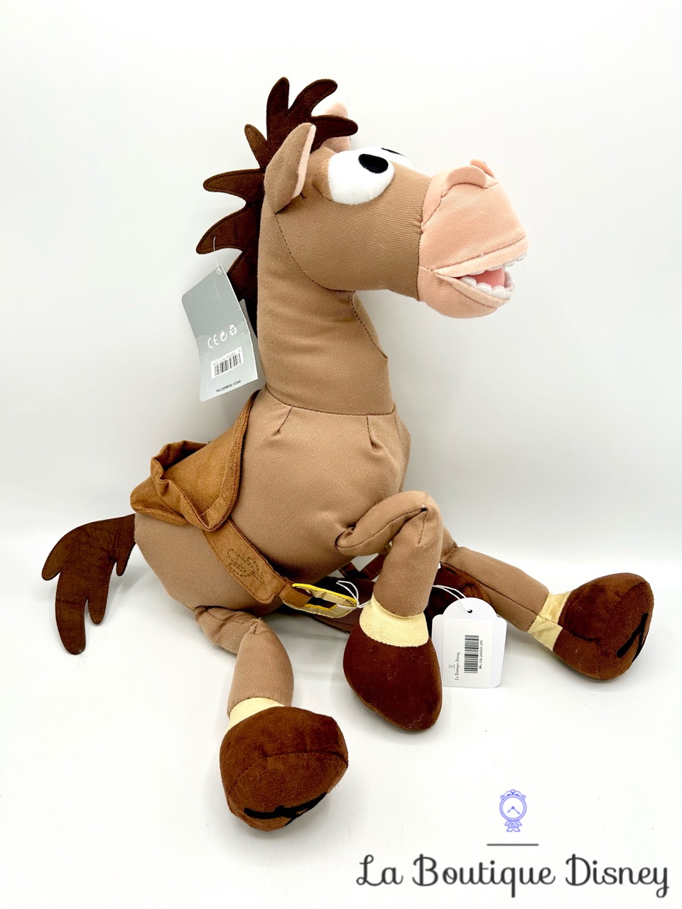 peluche-pile-poil-cheval-toy-story-disney-store-écusson-grand-format-0
