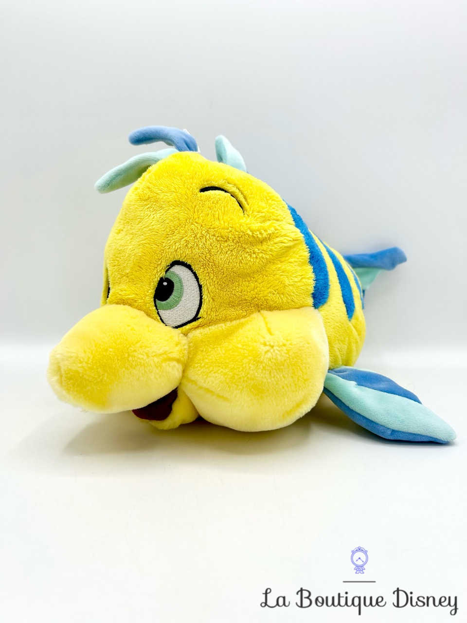 peluche-polochon-disneyland-paris-disney-la-petite-sirène-poisson-jaune-bleu-1