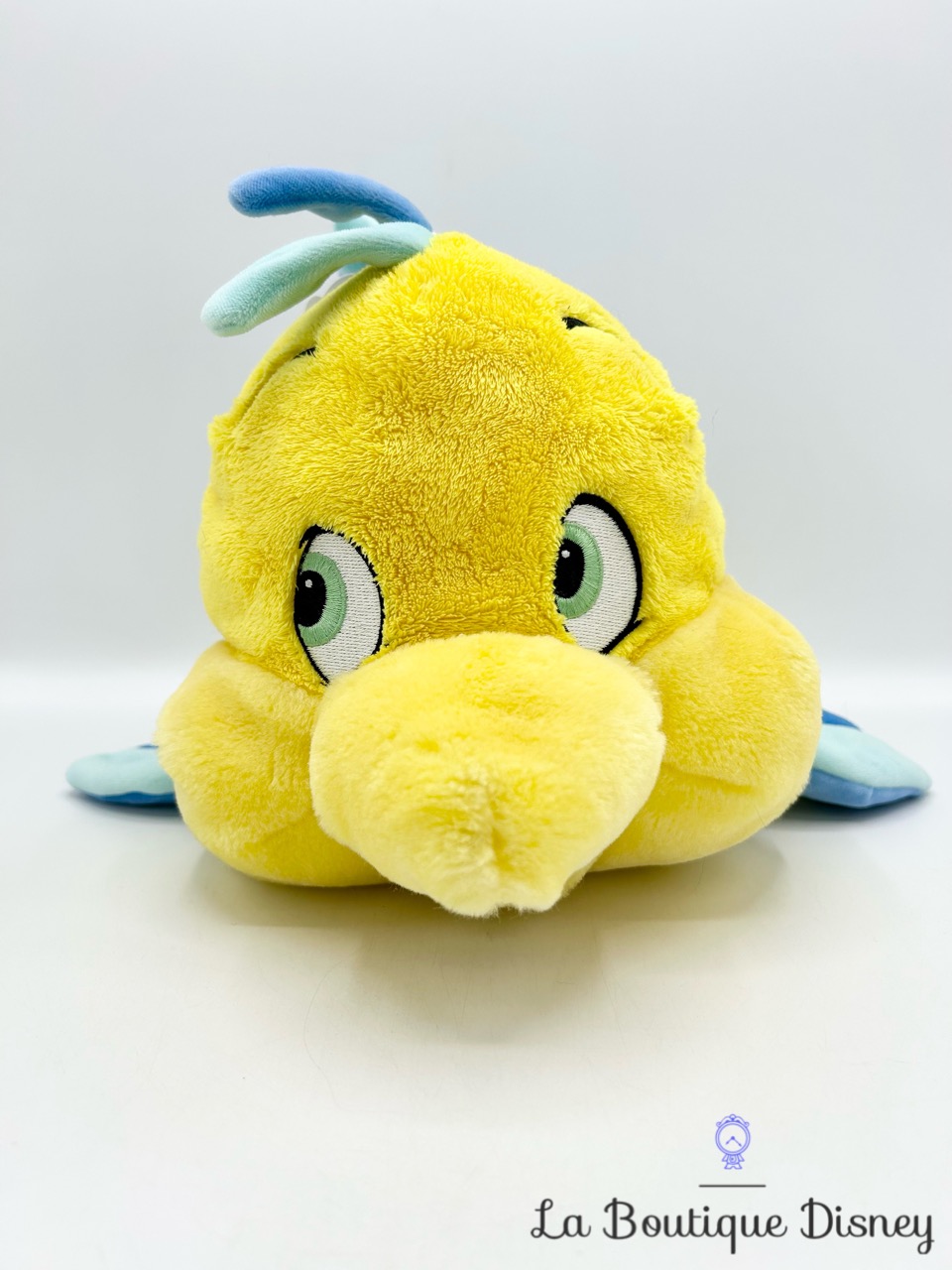 peluche-polochon-disneyland-paris-disney-la-petite-sirène-poisson-jaune-bleu-2