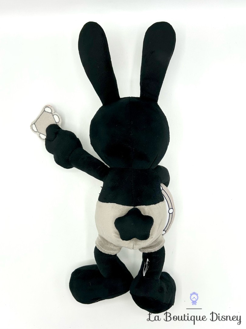 peluche-oswald-guitare-disney-100-disney-store-noir-blanc (1)