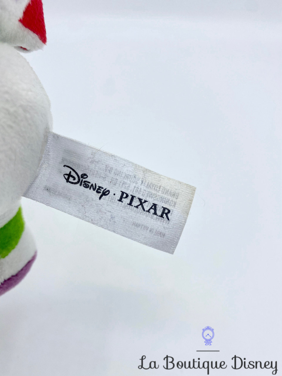 peluche-buzz-éclair-disney-pixar-toy-story-assis-cute-sourire-robot-violet-vert-4