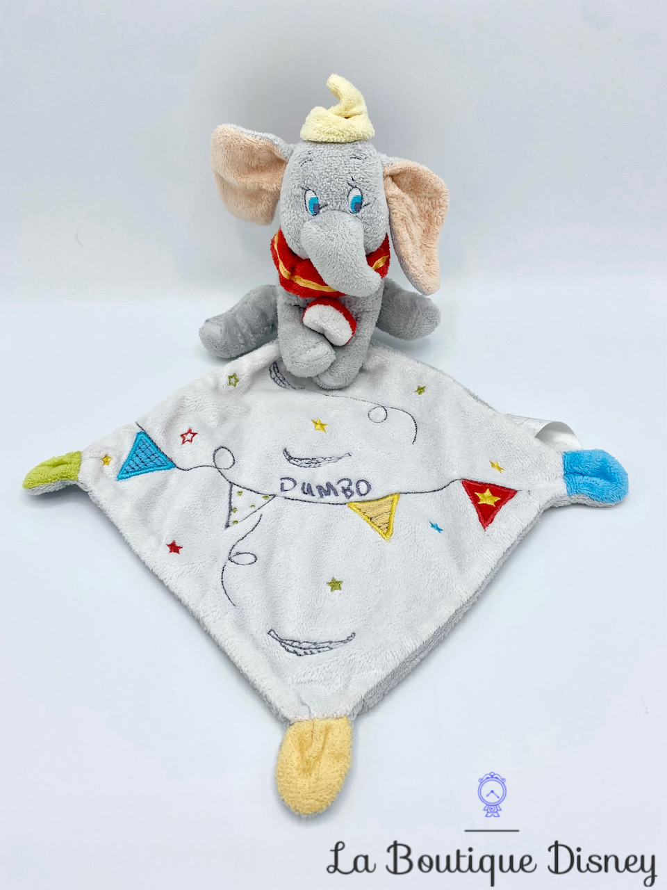 Peluche Doudou Dumbo Disney éléphant gris blanc carré cirque