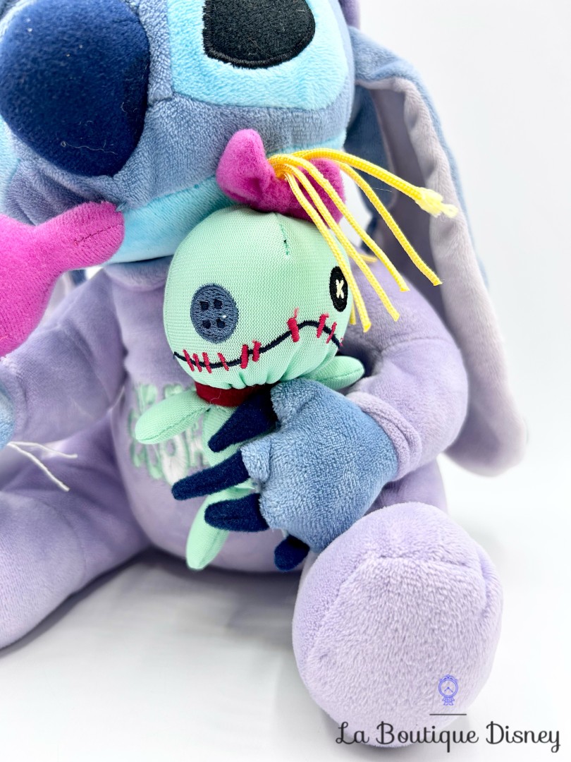 Peluche-Stitch-Souillon-Disneyland-Paris-2017-Disney-pyjama-violet-biberon-30-cm (6)