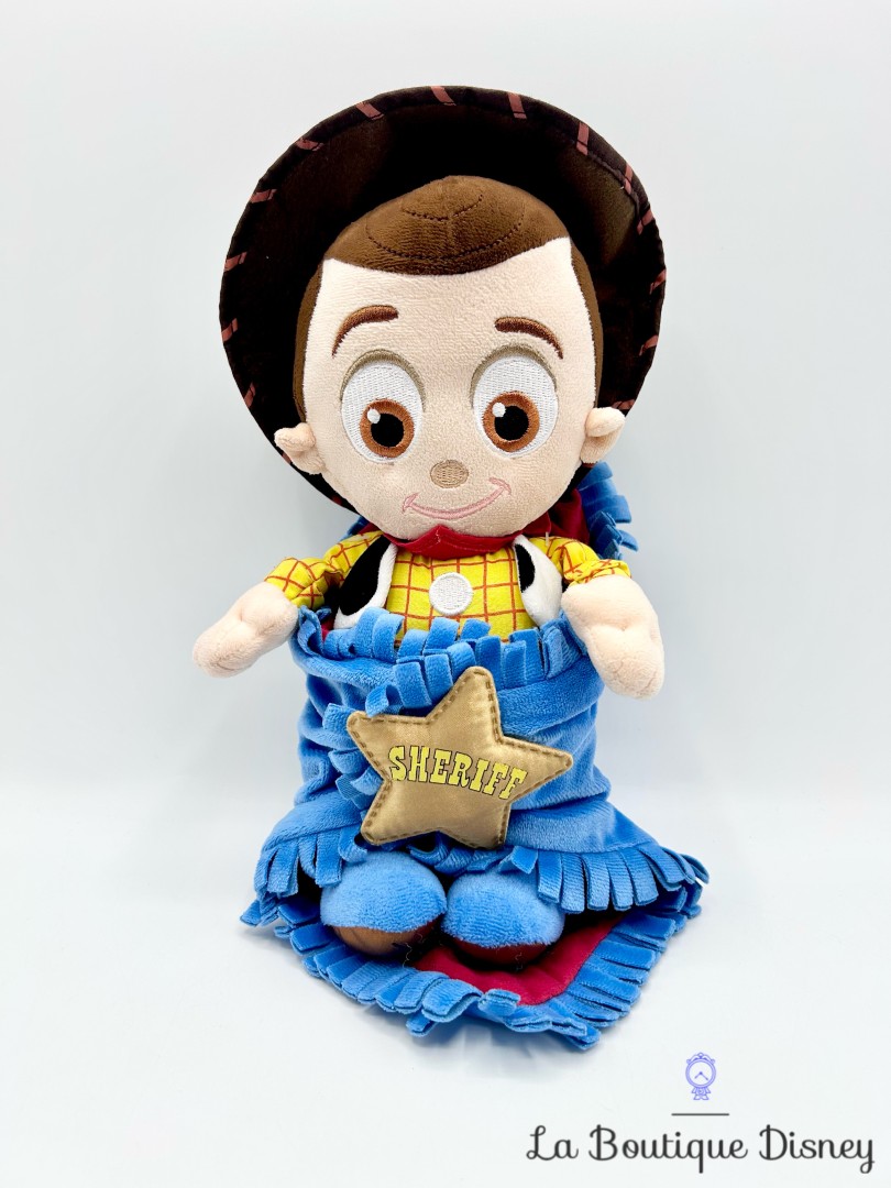 Peluche-Woody-Toy-Story-Disney-Babies-Disneyland-Paris-couffin-couverture-bleu-Sheriff