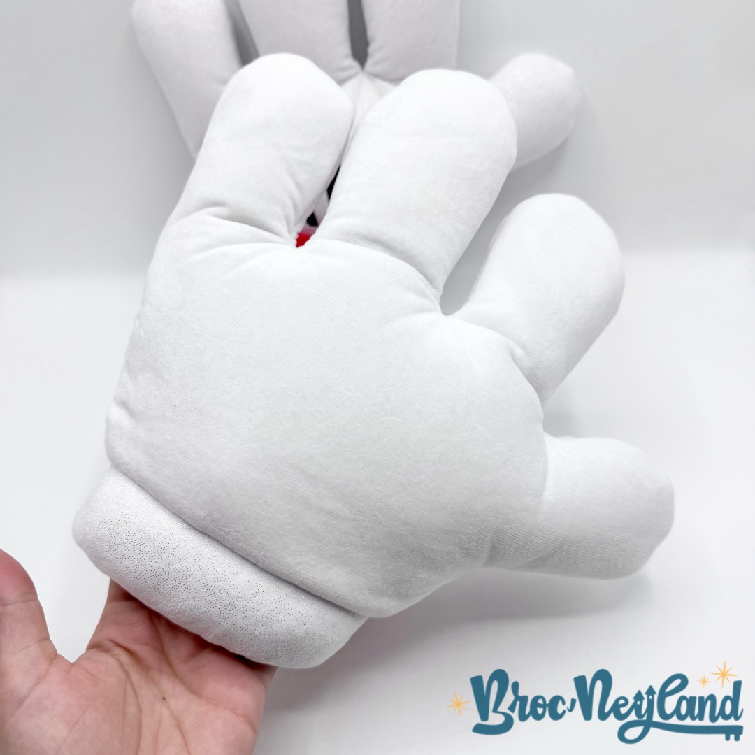 Gants-Minnie-Mouse-Disney-Store-2022-main-nœud-rouge-paillettes (1)