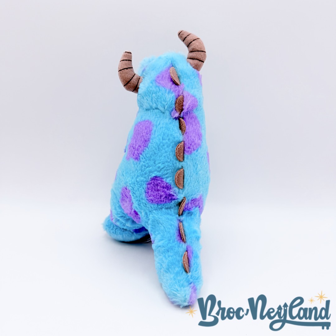 Peluche-bracelet-Sulli-Snuggle-Snappers-Disney-Parks-2017-disneyland-Monstres-et-Cie-Sully-bleu-accroche-calin (2)