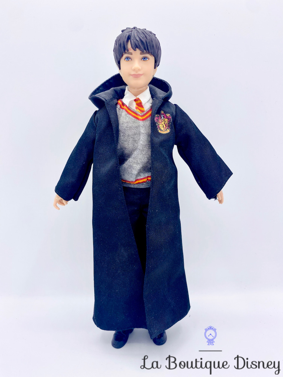 Harry Potter Poupée articulée de 26 cm en uniforme Gryffondor en tissu avec  baguette magique, à collectionner, jouet enfant, FYM50