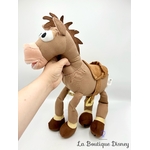 peluche-pile-poil-cheval-toy-story-disney-store-écusson-grand-format-2
