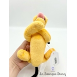 peluche-mini-pluto-couché-disney-store-chien-jaune-plat-ventre-dort-4