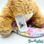 Peluche-Lady-emmaillotée-La-Belle-et-le-Clochard-Disney-Parks-2018-chien-marron-couverture-cocon-28-cm (6)