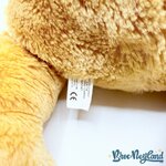 Peluche-Winnie-ourson-poils-longs-Disney-Store-jaune-écusson-52-cm (1)