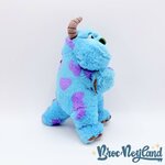Peluche-bracelet-Sulli-Snuggle-Snappers-Disney-Parks-2017-disneyland-Monstres-et-Cie-Sully-bleu-accroche-calin (4)