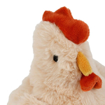 Détail crête rouge peluche poule