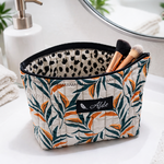 trousse-matelassee-tropical-ouverte-doublure-leopard.jpg