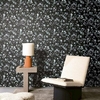 papier-peint-elysium-masureel-fleuri-noir-blanc