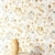 papier-peint-elysium-masureel-fleuri-jaune-ambre