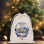 photo d une hotte de Noel boule de neige personnalisée avec prénom
