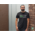 bearded-man-standing-next-to-a-brick-wall-t-shirt-mockup