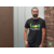 bearded-man-standing-next-to-a-brick-wall-t-shirt-mockup