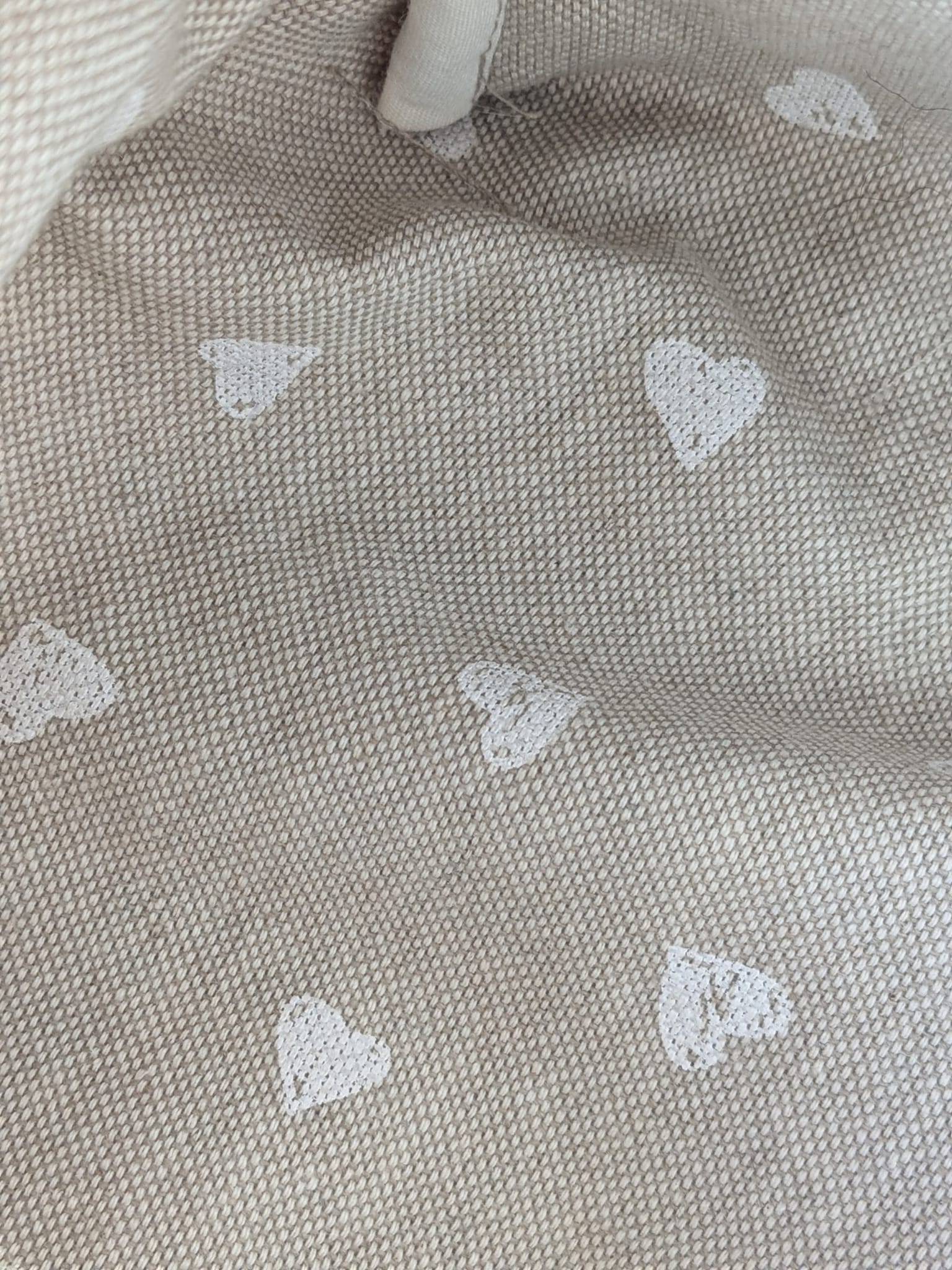 doublure beige coeurs blancs
