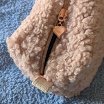 curseur trousse moumoute rose