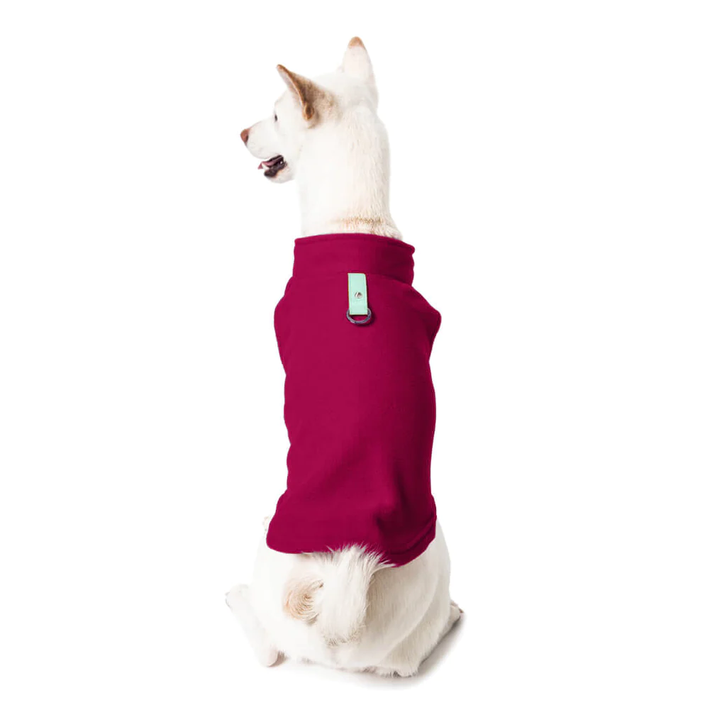 a-shiba-inu-wearing-gooby-fuschia-fleece-vest-with-green-tag-sitting-down-back-view-1024x1024px