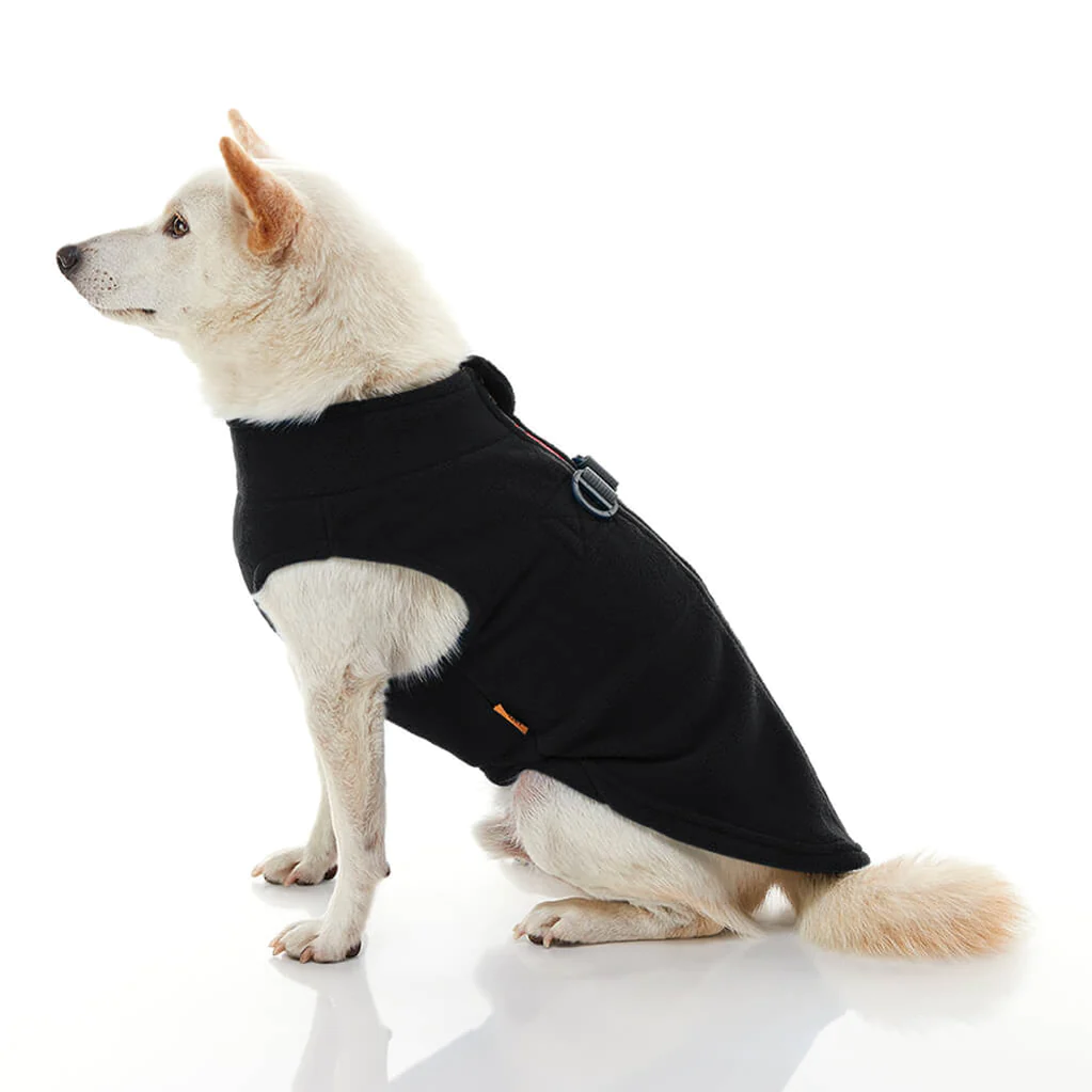 gooby-office-dog-loki-a-white-shiba-inu-wearing-black-zip-up-fleece-vest-sitting-down-side-view-1024x1024px