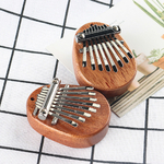 Mini-Piano-pouce-Kalimba-8-touches-en-bois-acrylique-petit-Instrument-de-musique-portable-pendentif-Mbira