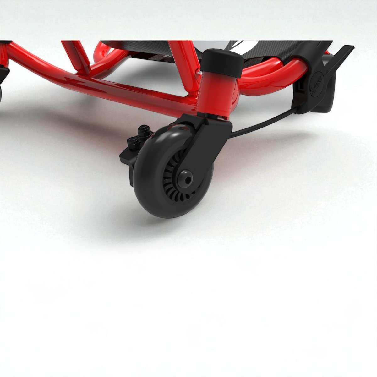 Zoom sur le frein manuel de l’Ezyroller Spinner X Rouge, conçu pour offrir plus de sécurité et de contrôle
