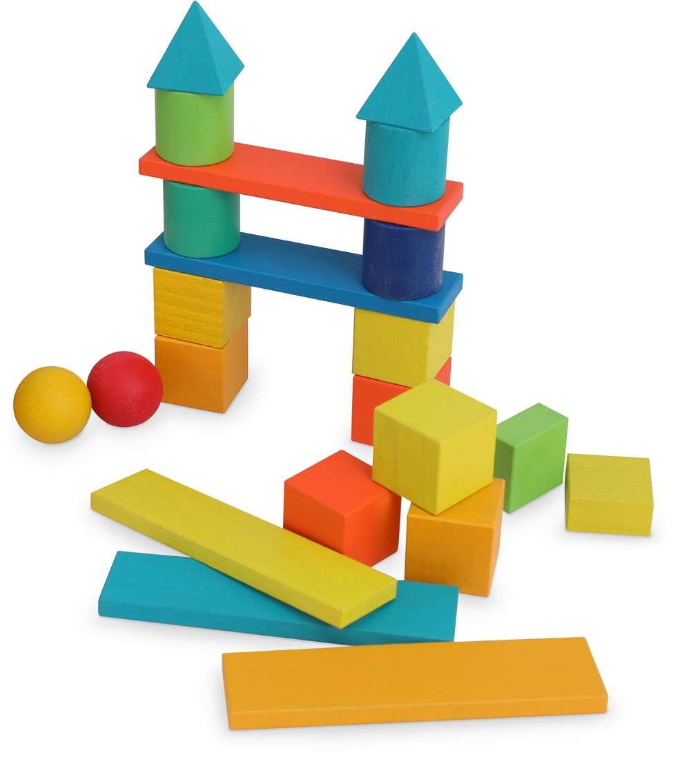 Exemple de construction réalisée avec les blocs Kinderfeets  tours, barres colorées et pièces arrondies posées au sol.