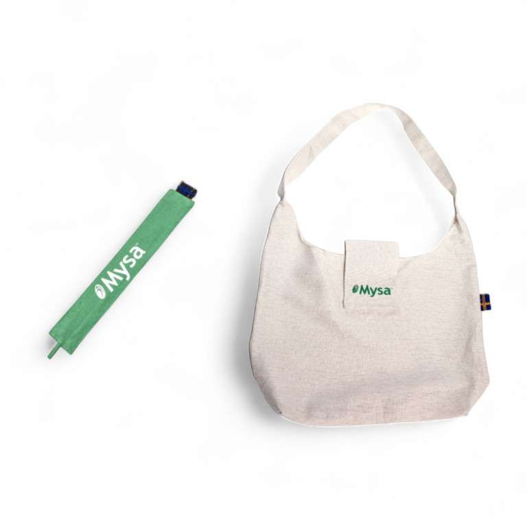 Sangle de jonction Mysa XXL verte et sac de transport beige posés côte à côte
