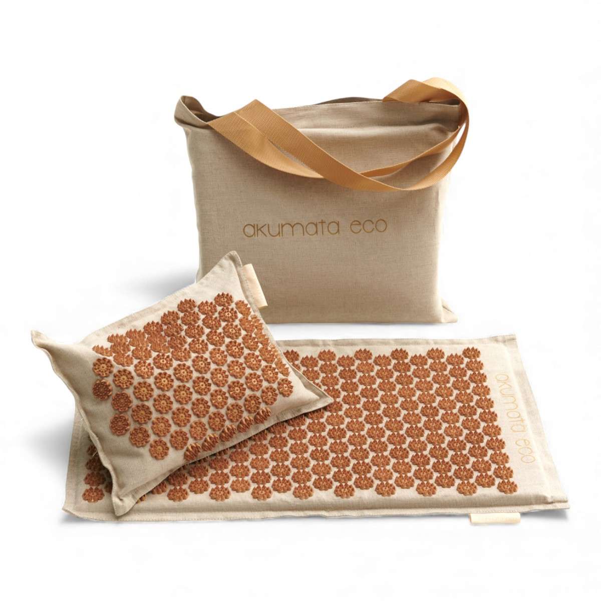 Tapis et coussin d’acupression Akumata Eco avec pointes dorées, accompagnés du sac de transport