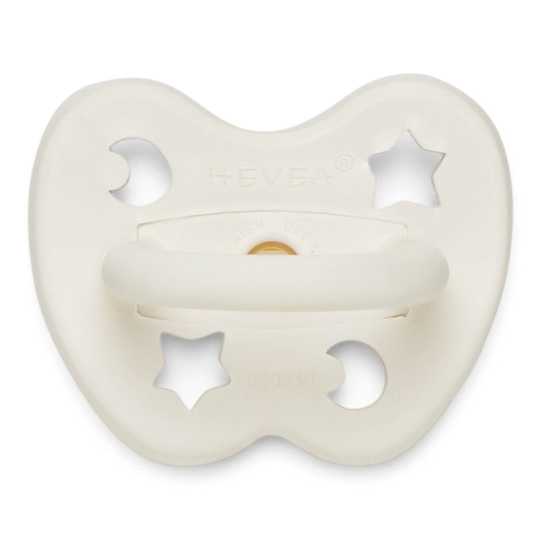 Tétine HEVEA Symétrique Milky White en caoutchouc naturel vue de profil