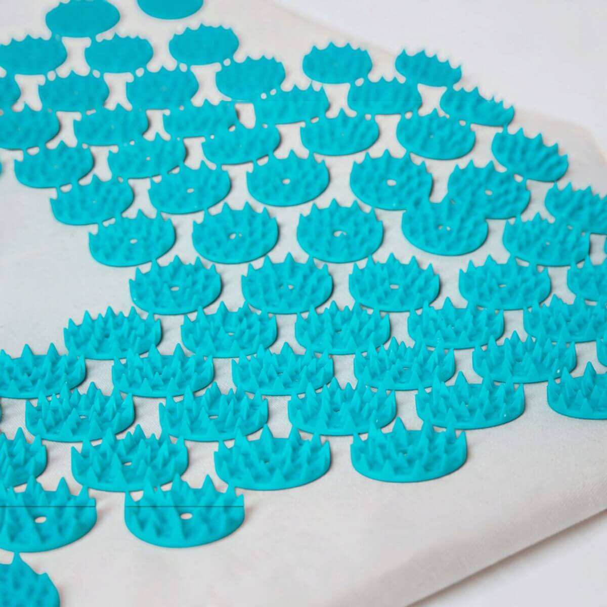 Picots pointus du coussin de réflexologie plantaire Climsom Zen vus de profil