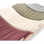 Matelas Wobbel Starter en plusieurs coloris alignés sur planche d’équilibre