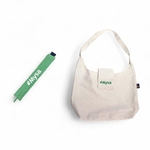 Sangle de jonction Mysa XXL verte et sac de transport beige posés côte à côte