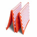 Tapis Magnetic Mysa XXL plié en sections, montrant la modularité et l’épaisseur du rembourrage.