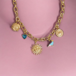 Collier charms marguerite coeur et soleil
