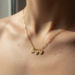 collier trois coeur dorés