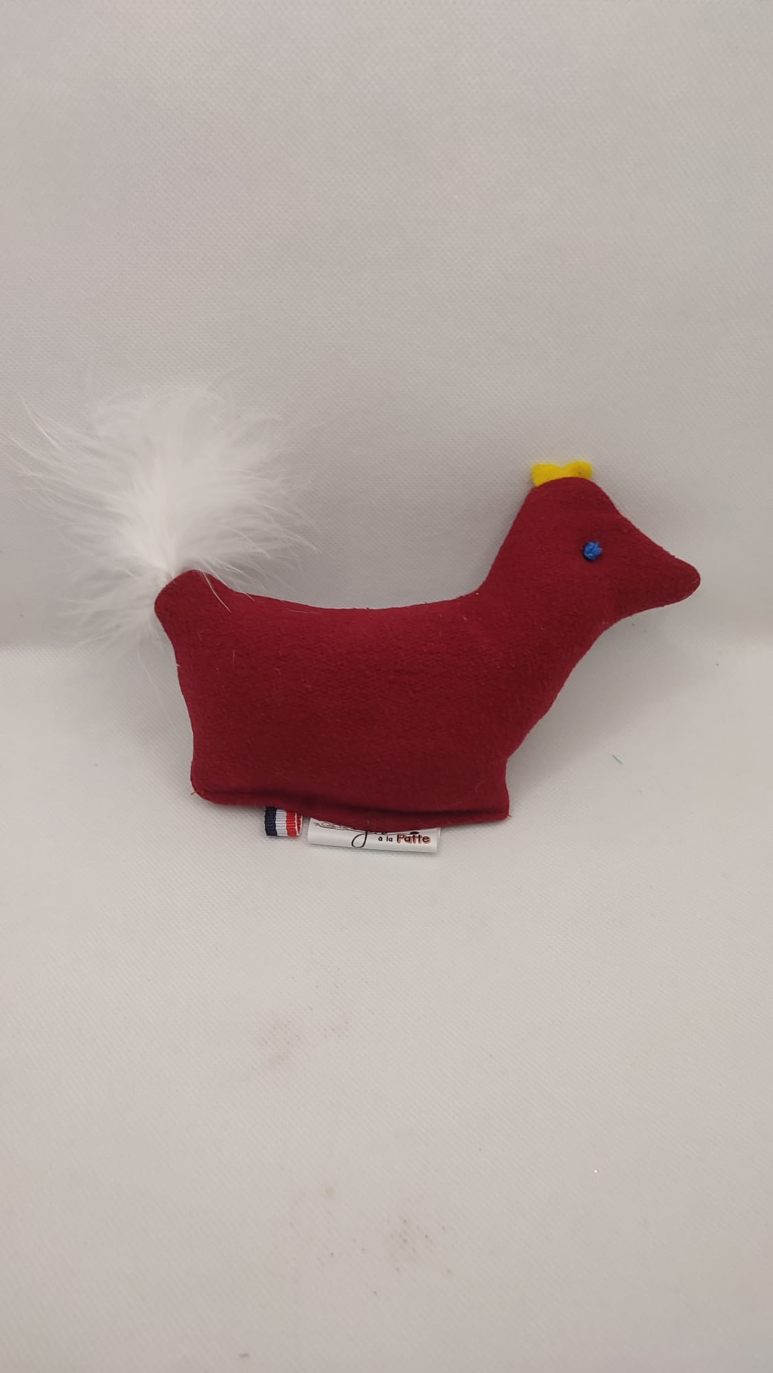 poulette rouge plumes blanches