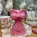 bougie corset rose face