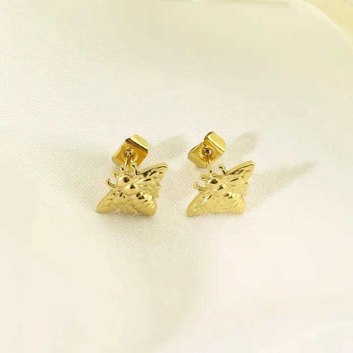 puce oreille abeille dorée